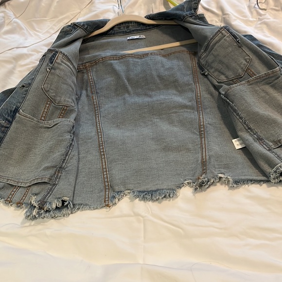 DEX jean jacket. Distressed edge. Stretchy denim. - Picture 7 of 8